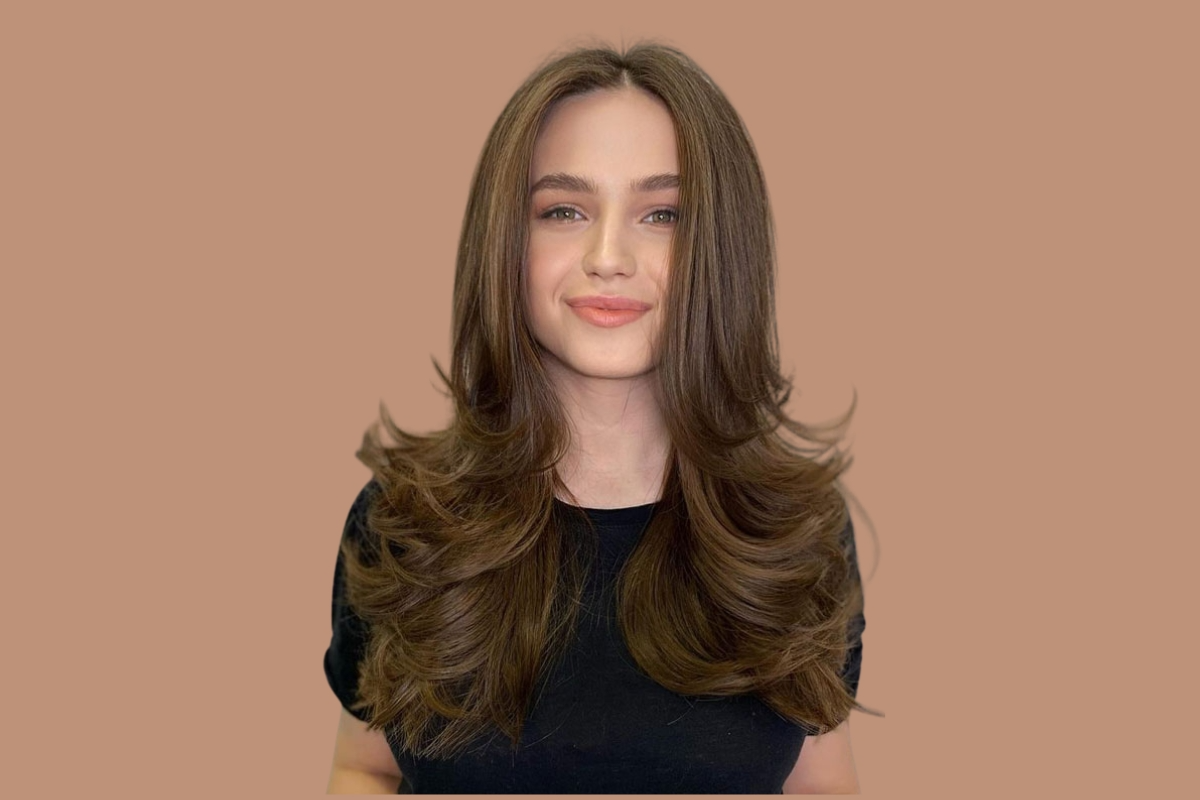 7 Cortes de Cabelo Femininos que Rejuvenescem 4 Franja-Cortininha-Curtain-Bangs